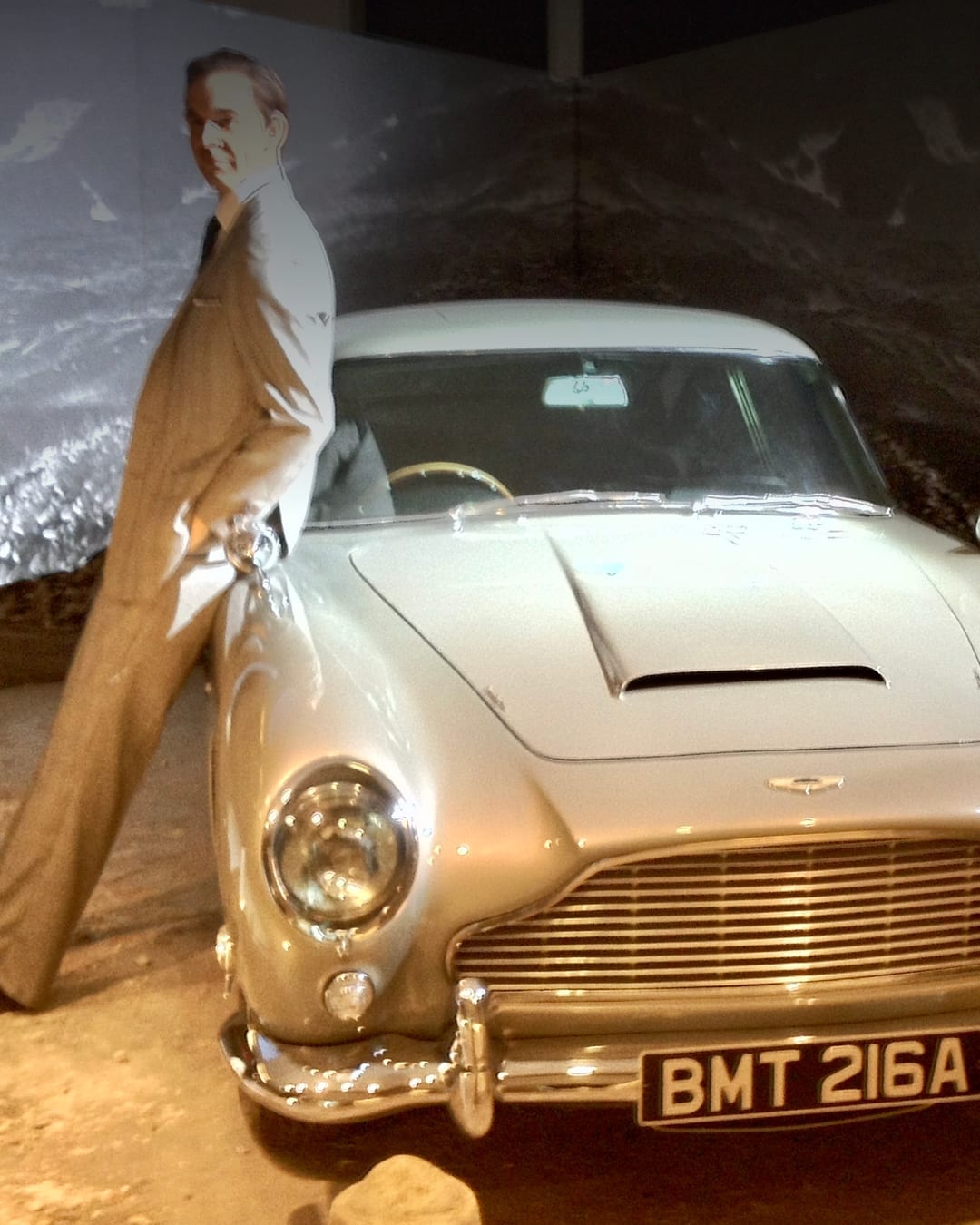Aston Martin DB5 displayed in a James Bond exhibition