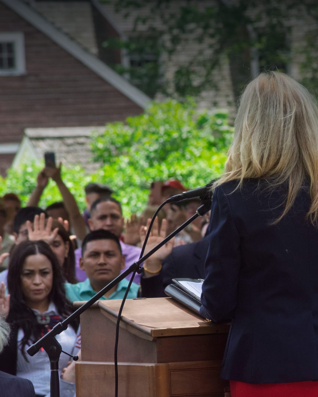New U.S. citizens take the oath during a naturalization ceremony