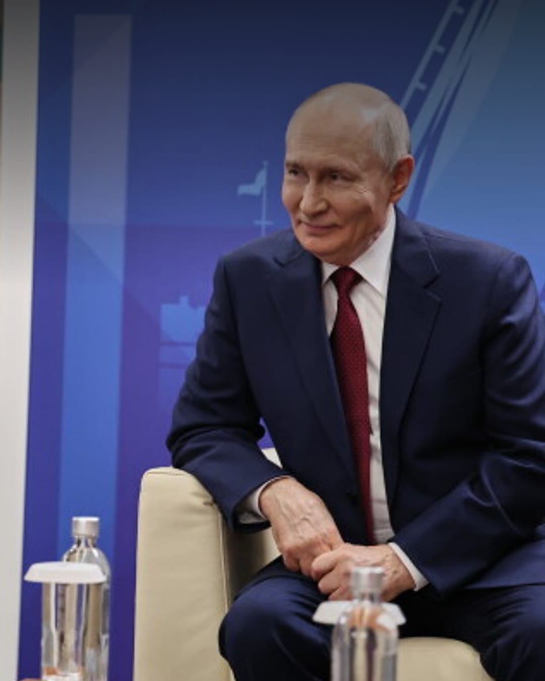 Vladimir Putin sits before a plenary session at the St. Petersburg International Economic Forum