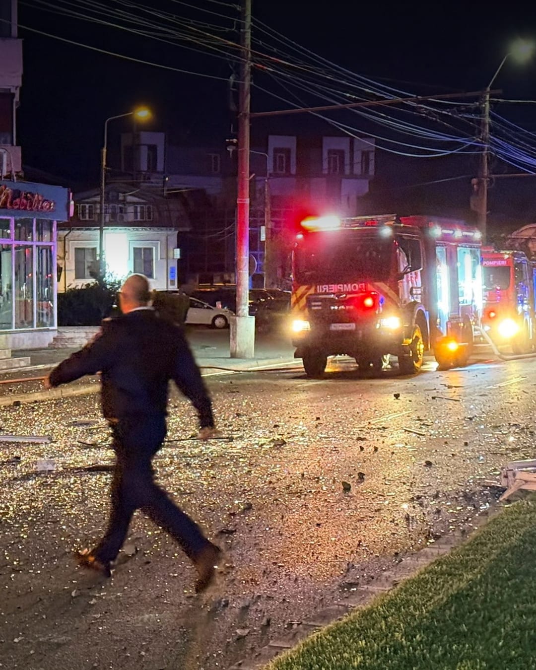 Debris on the street in Galati after a Russian drone hit an apartment building