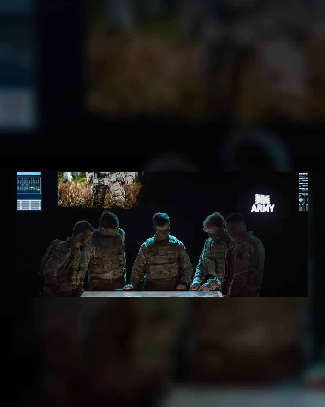 British Army personnel view a digital targeting display during an ASGARD demonstration